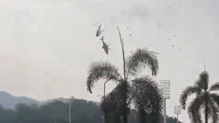 Tangkapan layar unggahan video menampilkan detik-detik dua helikopter Angkatan Laut Malaysia bertabrakan, Selasa (23/4/2024).