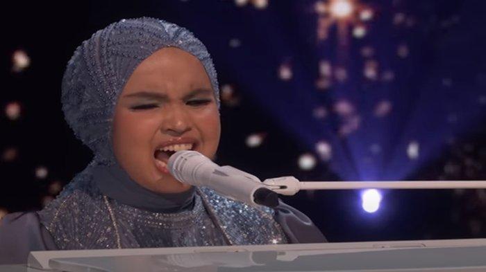 Lirik lagu dan arti bahasa indonesia Don't let the sun go down on me dari Penyanyi Putri Ariani.