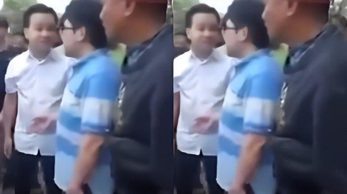 Tangkap layar video viral saat Ivan Sugianto paksa siswa sujud dan menggonggong didampingi pria berbadan kekar.
