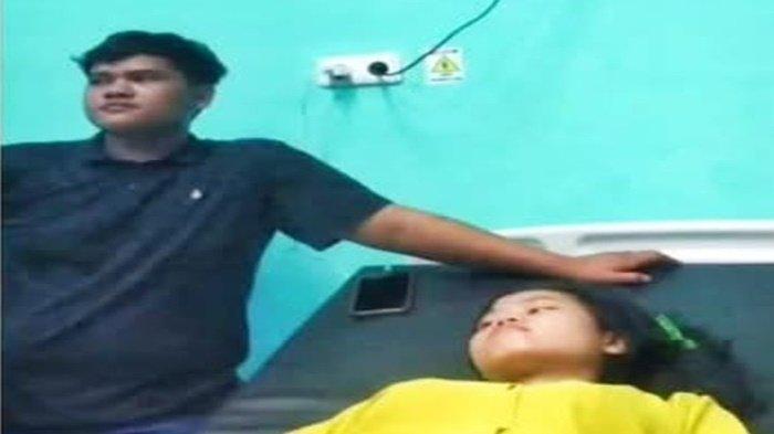 DATANGI PUSKESMAS - Dua pelaku rekayasa perampokan agen BRILink saat berada di Puskesmas Tanjung Raja, Senin (14/4/2025). Keduanya kini diamankan di Mapolsek Tanjung Raja.