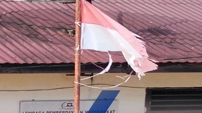 BENDERA LUSUH - Potret viral bendera lusuh dan robek di depan kantor lurah di Lubuklinggau, Sumatera Selatan. Warga miris melihat kondisi memprihatinkan tersebut. Camat pun ikut buka suara, Selasa (10/6/2025).
