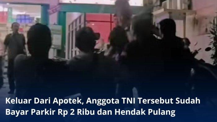 Tangkapan layar video viral anggota TNI dikeroyok dua remaja yang bekerja sebagai tukang parkir.