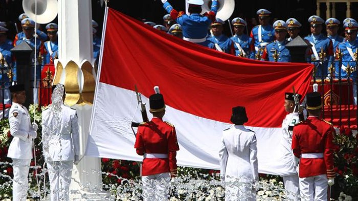 Ilustrasi Pasukan pengibar bendera pusaka (Paskibraka) mengibarkan bendera Merah Putih Nasional di hari ulang tahun Kemerdekaan Republik Indonesia (RI)