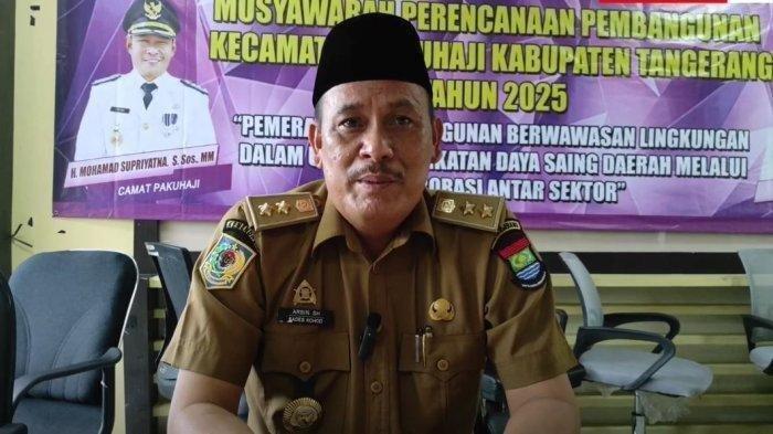 KADES KOHOD MANGKIR - Foto dokumentari Arsin Kepala Desa Kohod, Kecamatan Pakuhaji, Kabupaten Tangerang.