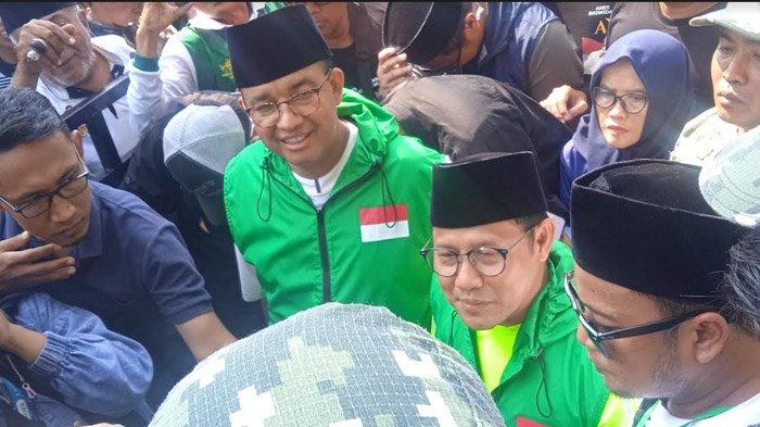 Pasangan Anies Baswedan dan Muhaimin Iskandar mengikuti jalan sehat di GOR Kaliwates Jember pekan lalu.
