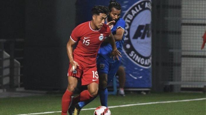 Pemain Persebaya Surabaya, Song Ui-Young saat memperkuat Timnas Singapura