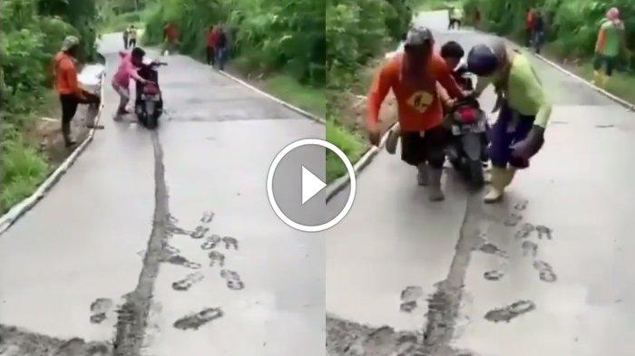 Seorang pemotor nekat menerobos adona beton jalan yang masih basah di Desa Tugu, Kecamatan Sendang, Kabupaten Tulungagung. 