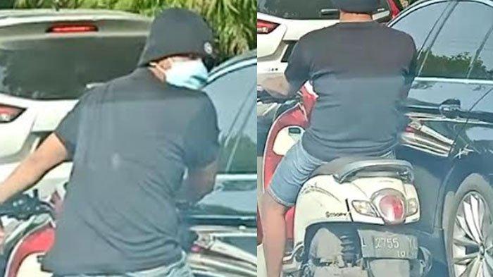 Tangkapan layar video FN merusak ban mobil di jalan raya di Surabaya yang viral. Terbaru, Satreskrim Polrestabes Surabaya menangkap FN pada Selasa (27/6/2023).