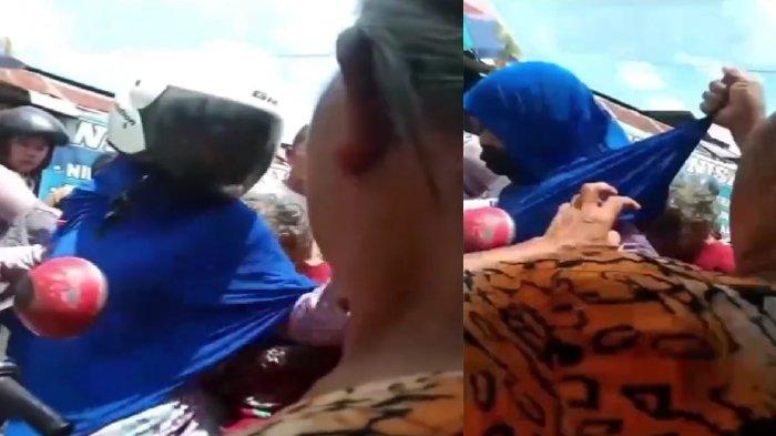 Emak-emak cek-cok dengan warga di pasar saat hendak membawa nenek tersebut