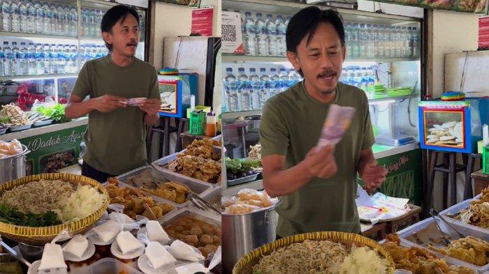 Epy Kusnandar melayani pembeli di warungnya