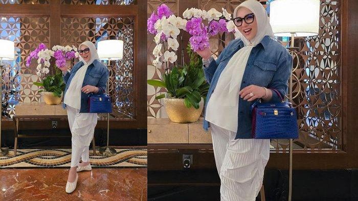 Gaya terbaru Syahrini pamer tas mahal
 