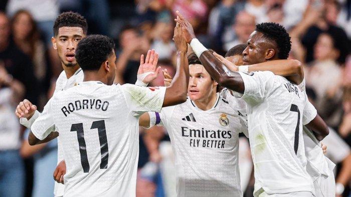 SELEBRASI : Selebrasi pemain Real Madrid setelah berhasil mencetak gol ke gawang Espanyol pada pekan keenam Liga Spanyol, Minggu (22/9/2024) dini hari WIB. Berikut Jadwal Liga Champions dan prediksi skor Juventus vs Man City, Girona vs Liverpool, Atalanta vs Real Madrid dan Dortmund vs Barcelona tengah pekan ini.