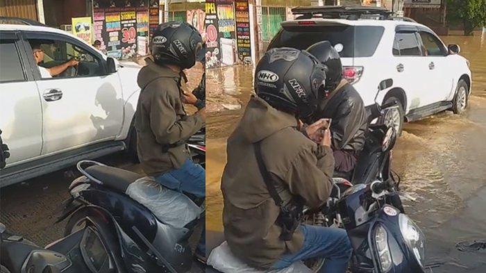 Video mobil Fortuner nekat terabas banjir yang cukup tinggi