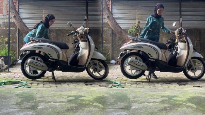 Wanita pemilik motor mengubah standar motor sebelum di-starter