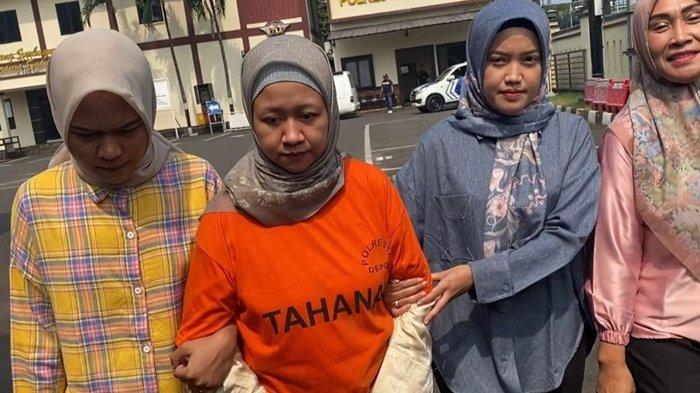Meita Irianty merupakan tersangka kasus penganiyaan terhadap dua balita MK berusia 2 tahun dan HW berusia 9 bulan.