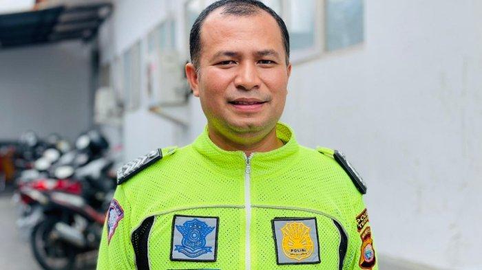 HUKUM: Anggota Satlantas Polres Ternate, Bripka Rivan saat dimintai keterangan usai membuat laporan di Ditreskrimsus Polda Maluku Utara, Selasa (6/8/2024)