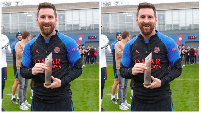 Lionel Messi berpose setelah para staf dan pemain Paris Saint-Germain (PSG) mengadakan 'guard of honour' atau 'kawalan penghormatan' atas pencapaiannya bersama Argentina menjuarai Piala Dunia 2022.