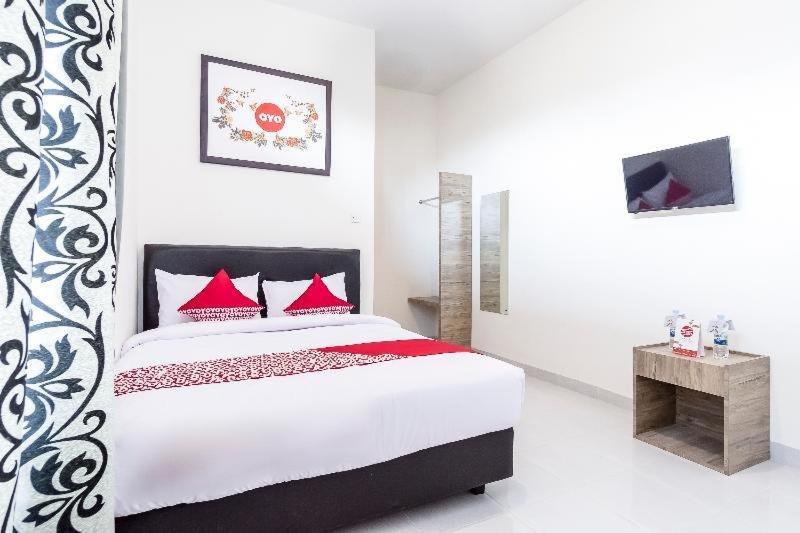 Ilustrasi tipe kamar yang ada di Capital O Kamani Homestay Syariah Medan