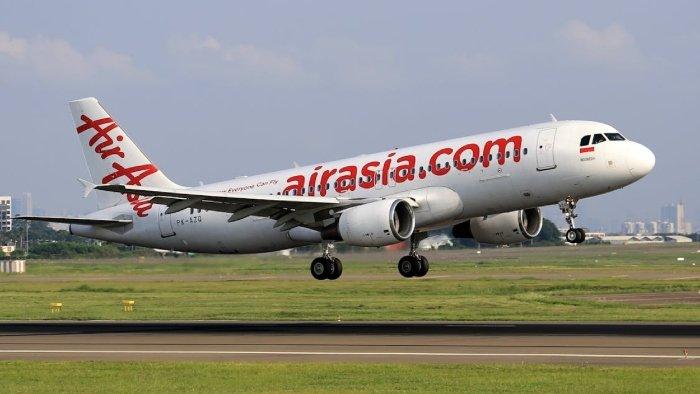 Gambar pesawat Air Asia rute Jakarta-Bali untuk liburan akhir tahun.
