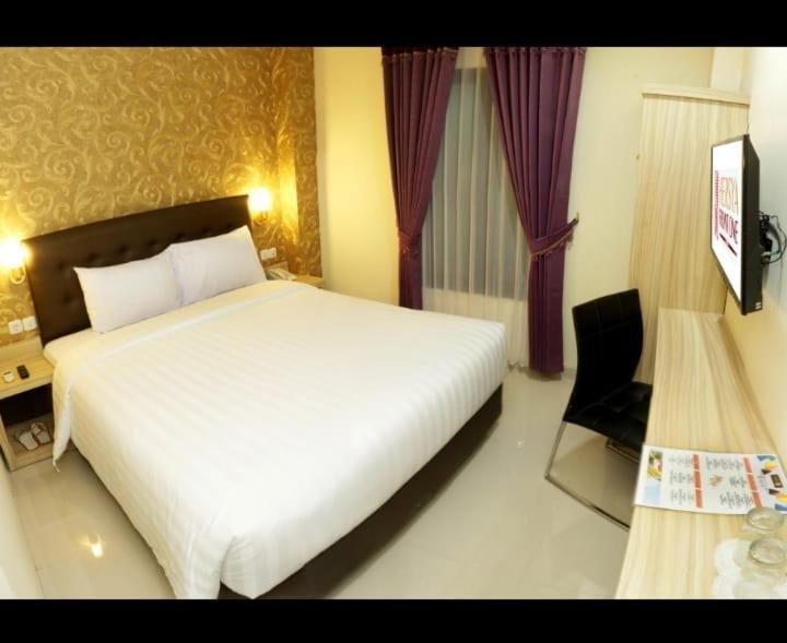 Ilustrasi kamar yang ada di Hersya Front One Inn Surabaya