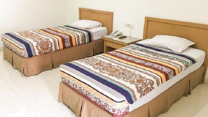 Kamar penginapan di hotel Hotel Sulawesi Kertajaya, Surabaya.