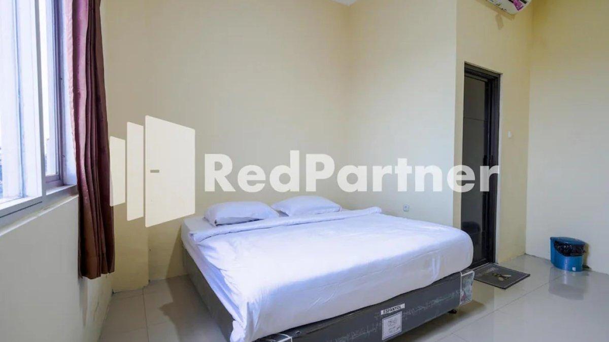 Ilustrasi SM Guest House Malang Mitra RedDoorz