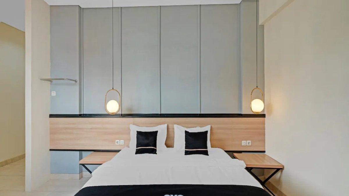 Ilustrasi salah satu kamar yang ada di Collection O 90774 Homi Stay
