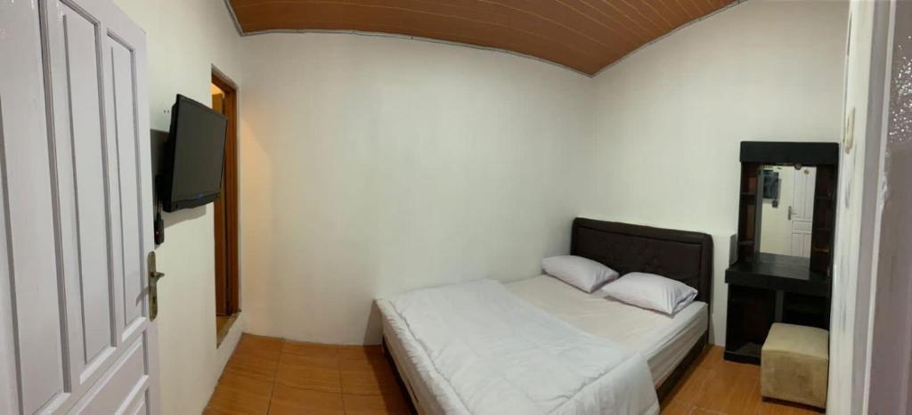 Ilustrasi tipe kamar yang ada di Dieng Plateau Guest House