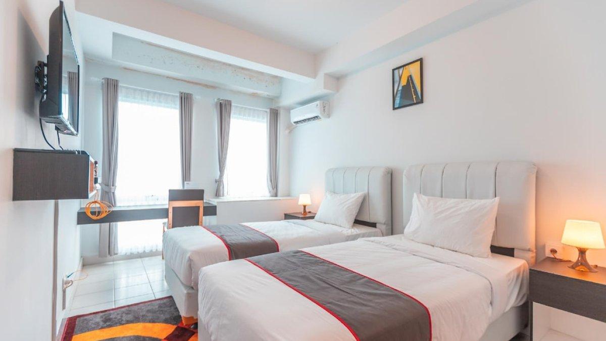 Ilustrasi tipe kamar yang ada di SUPER OYO Collection O 24 Patraland Urbano