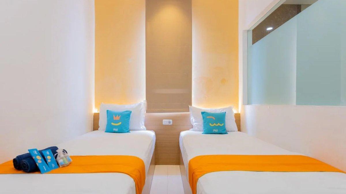 Ilustrasi tipe kamar yang ada di Sans Hotel Box Mansion Surabaya by RedDoorz