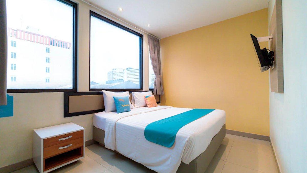 Ilustrasi tipe kamar yang ada di Sans Hotel Liv Ancol by RedDoorz