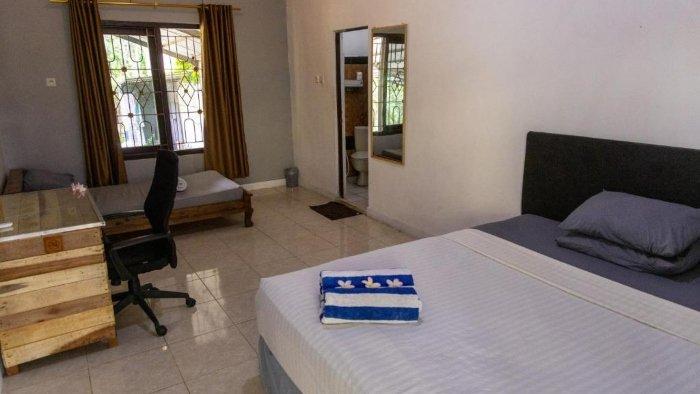 Ilustrasi kamar Happy Spiritus Guethouse, Tabanan, Bali.