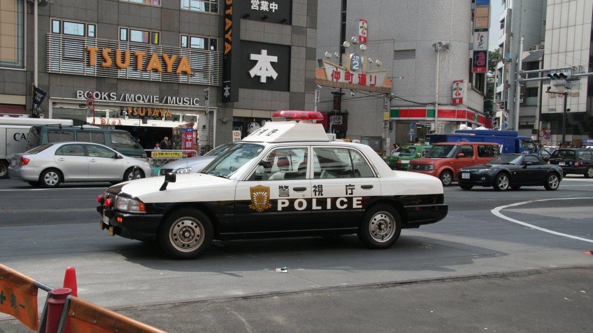 Ilustrasi mobil polisi yang sedang bertugas di Jepang