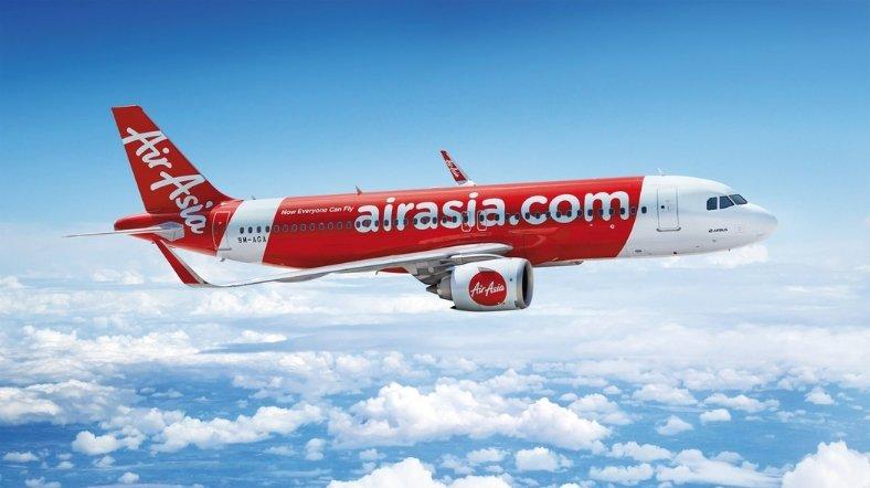 Pesawat AirAsia yang sedang mengudara.
