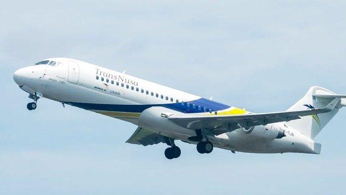 Pesawat TransNusa yang sedang mengudara.