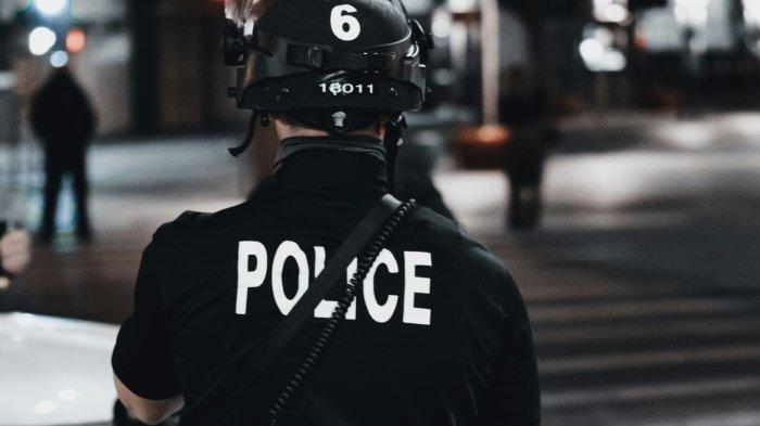 Ilustrasi petugas polisi.