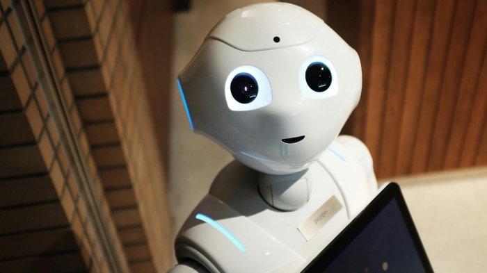 Ilustrasi robot yang bekerja di perusahaan.
