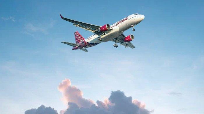 Ilustrasi tiket pesawat Batik Air yang sedang mengudara.
