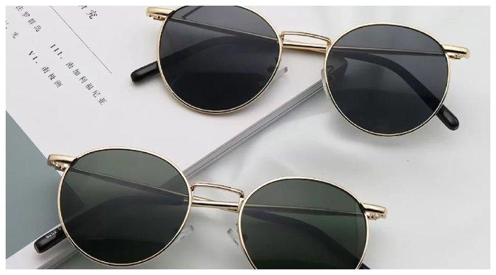 Kacamata hitam untuk traveling wanita, produk dari Gently Morley
