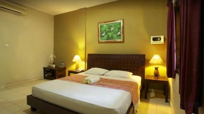 Kamar penginapan di Gemini Star Hotel.