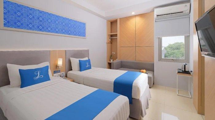 Kamar penginapan di Hotel Laksana Solo Managed By Dafam Kota Solo, Jawa Tengah.
