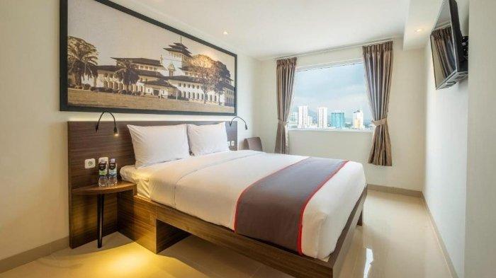 Kamar penginapan di SUPER OYO Collection O Hotel Pasar Baru Heritage Bandung, Jawa Barat.