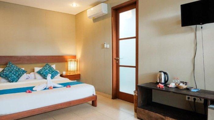 Kamar penginapan di Semarandana Hotel Sanur, Bali.