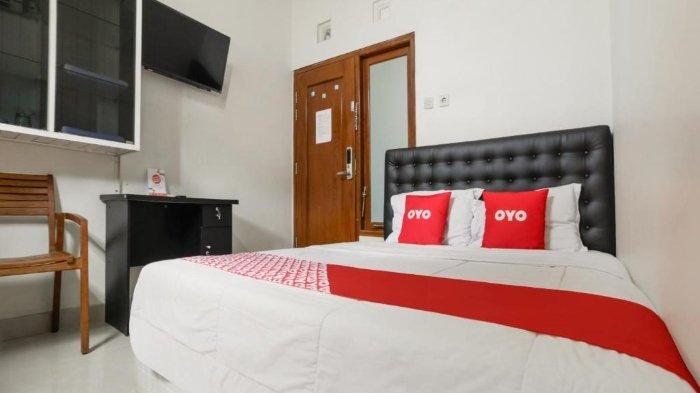 Kamar penginapan di hotel murah Super OYO 3838 Tamansari Guest House Kota Solo, Jawa Tengah.