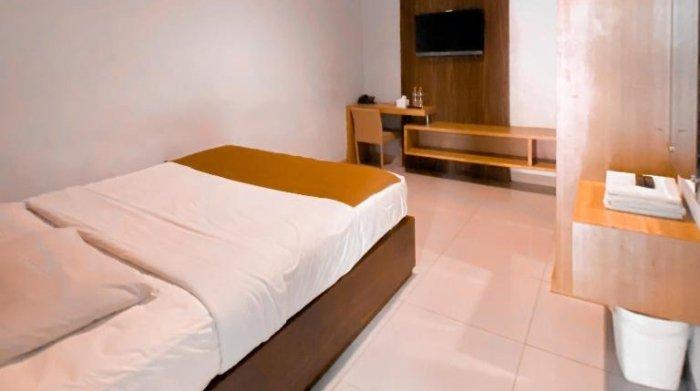 Kamar penginapan nyaman di Dinasty Style Hotel Solo, Jawa Tengah.