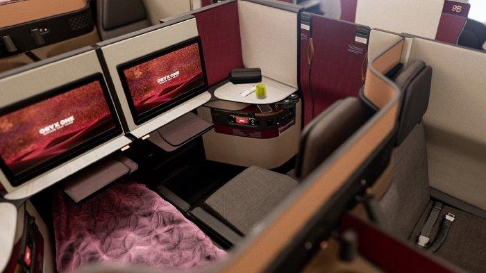 Kelas bisnis di pesawat Qatar Airways. Baru-baru ini penumpang Qatar Airways terpaksa telanjang karena suhu di pesawat melonjak bak terkurung dalam sauna lantaran AC mati.
