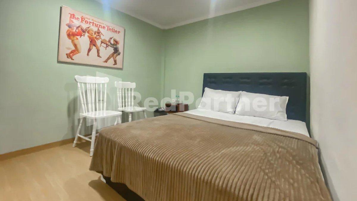 Ilustrasi salah satu tipe kamar yang ada di Mamifokobo Guesthouse Puncak Mitra RedDoorz