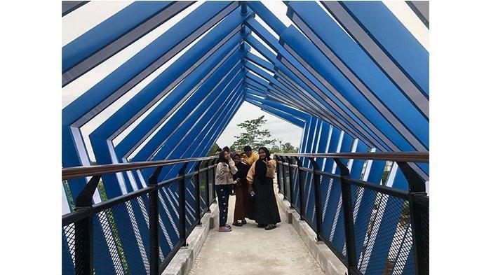 Mempura Skywalk, satu tempat wisata terbaik di Siak Riau yang wajib dikunjungi.