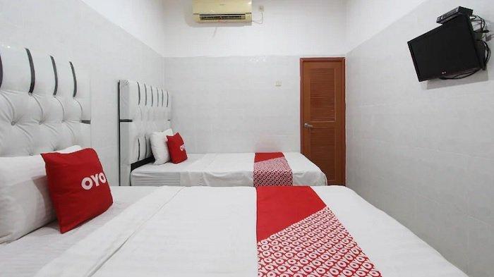 Kamar penginapan di hotel OYO 93011 Hotel Griya Lestari Pati 2, Jawa Tengah.