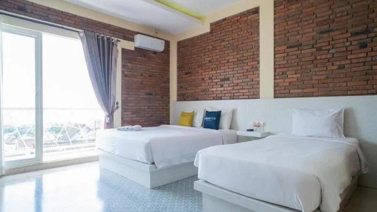 Ilustrasi tipe kamar yang ada di Urbanview Hotel Omah Anin Batu by RedDoorz